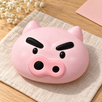 Zaemon Squishy Toy in a warm wooden-table lifestyle scene