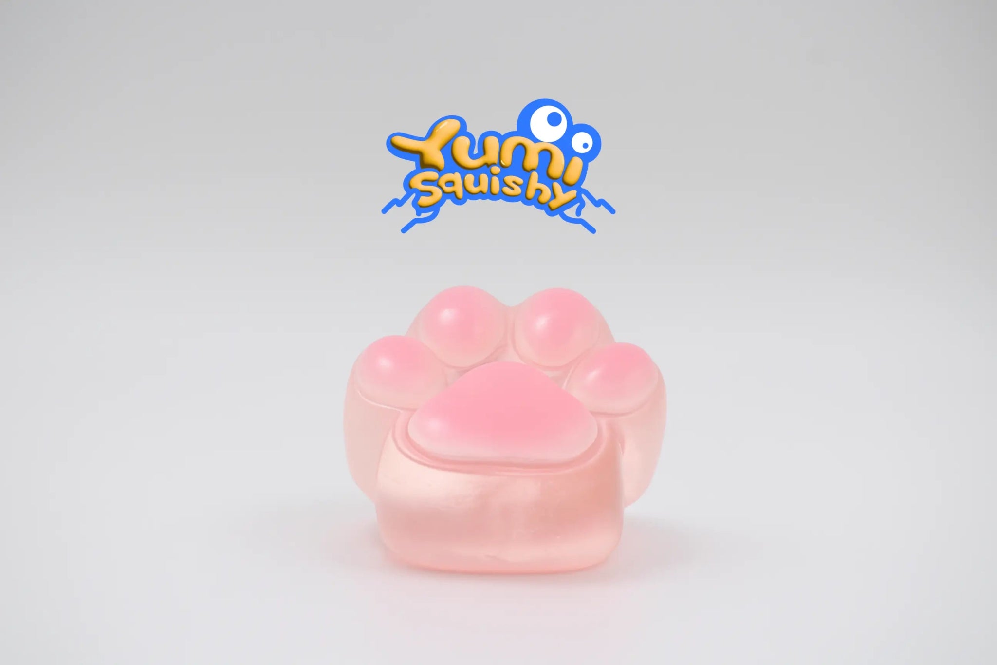 Pink Transparent Cat Paw Squishy toy, soft jelly paw design with clear silicone and pink beans, kawaii stress relief toy.